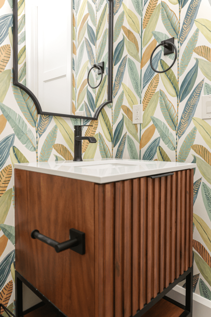 bold wallpaper powder bath interior design by Kirkendall Design in Tulsa, OK