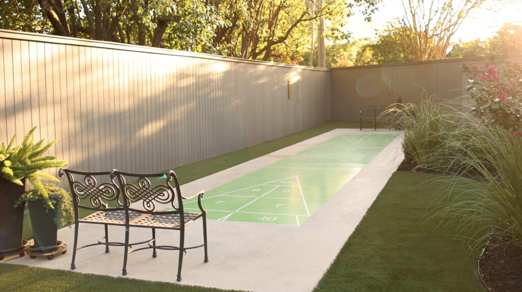 pickleball court with chair, outdoor living idea by Kirkendall Design