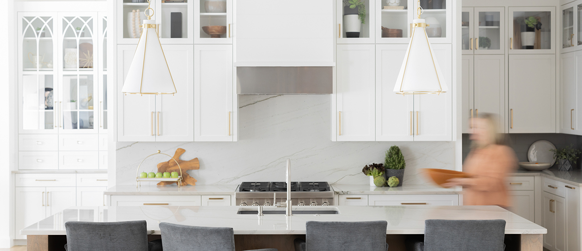 Julia Kirkendall in luxury kitchen. Interior design services by Kirkendall Design of Tulsa OK