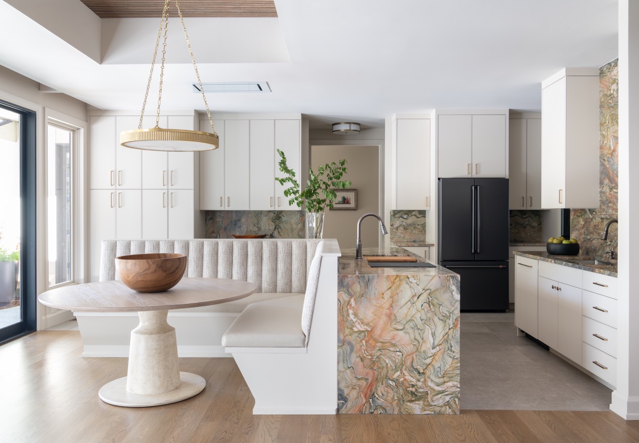 beautiful modern kitchen with breakfast nook designed by Kirkendall Design