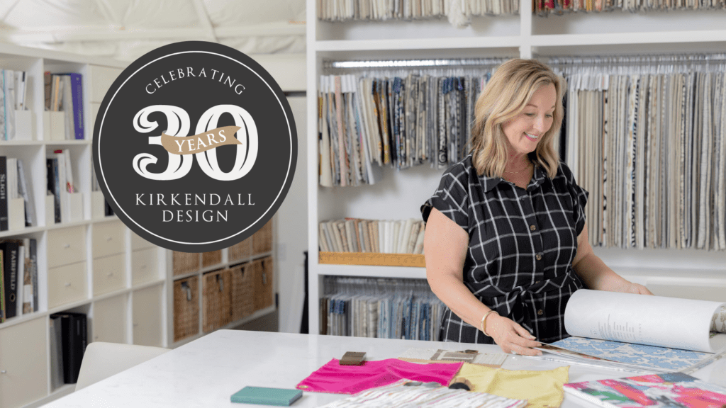 Julia flips through interior design samples; reflects back on 30th anniversary of Kirkendall Design