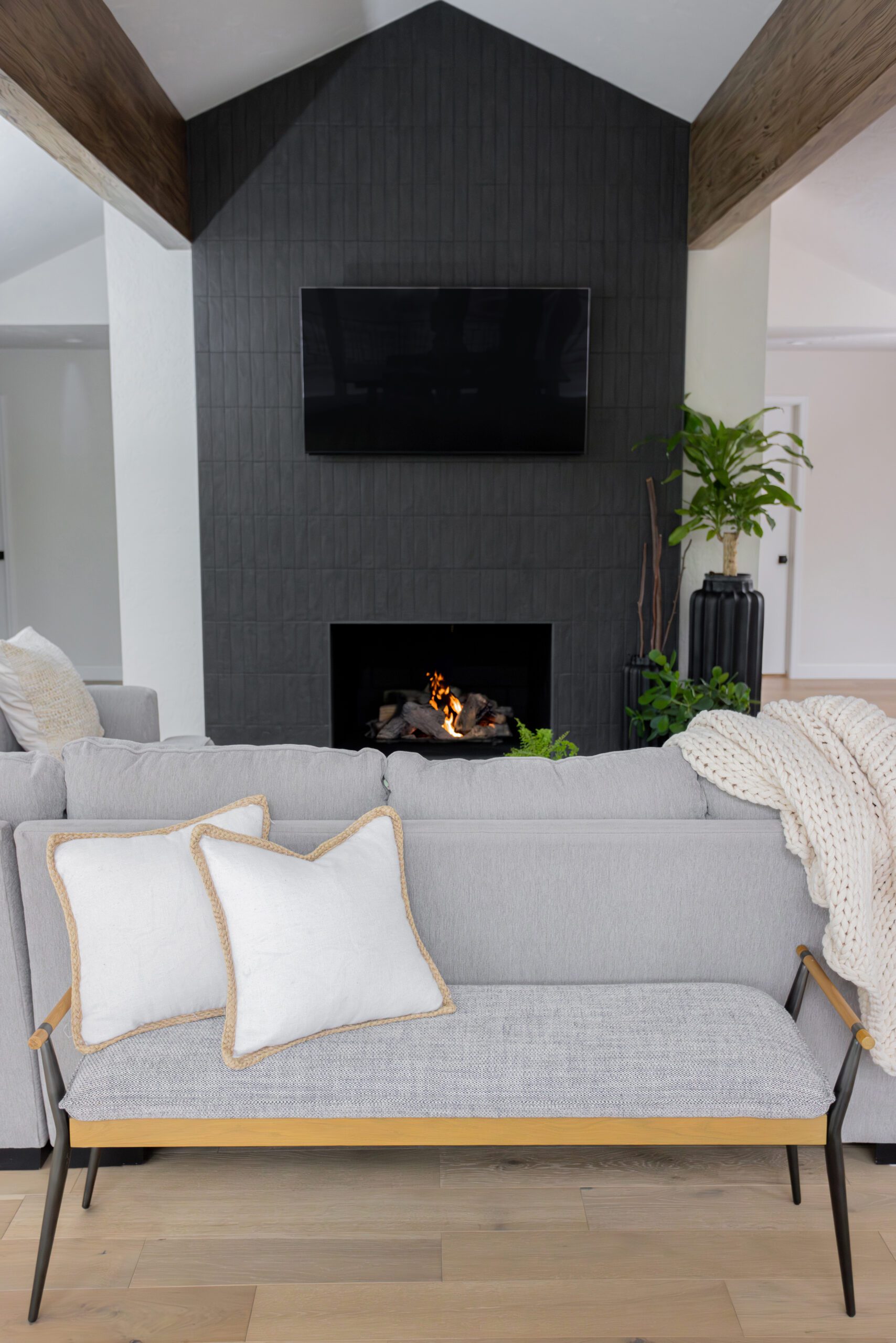 black stone fireplace interior design by Kirkendall Design in Tulsa