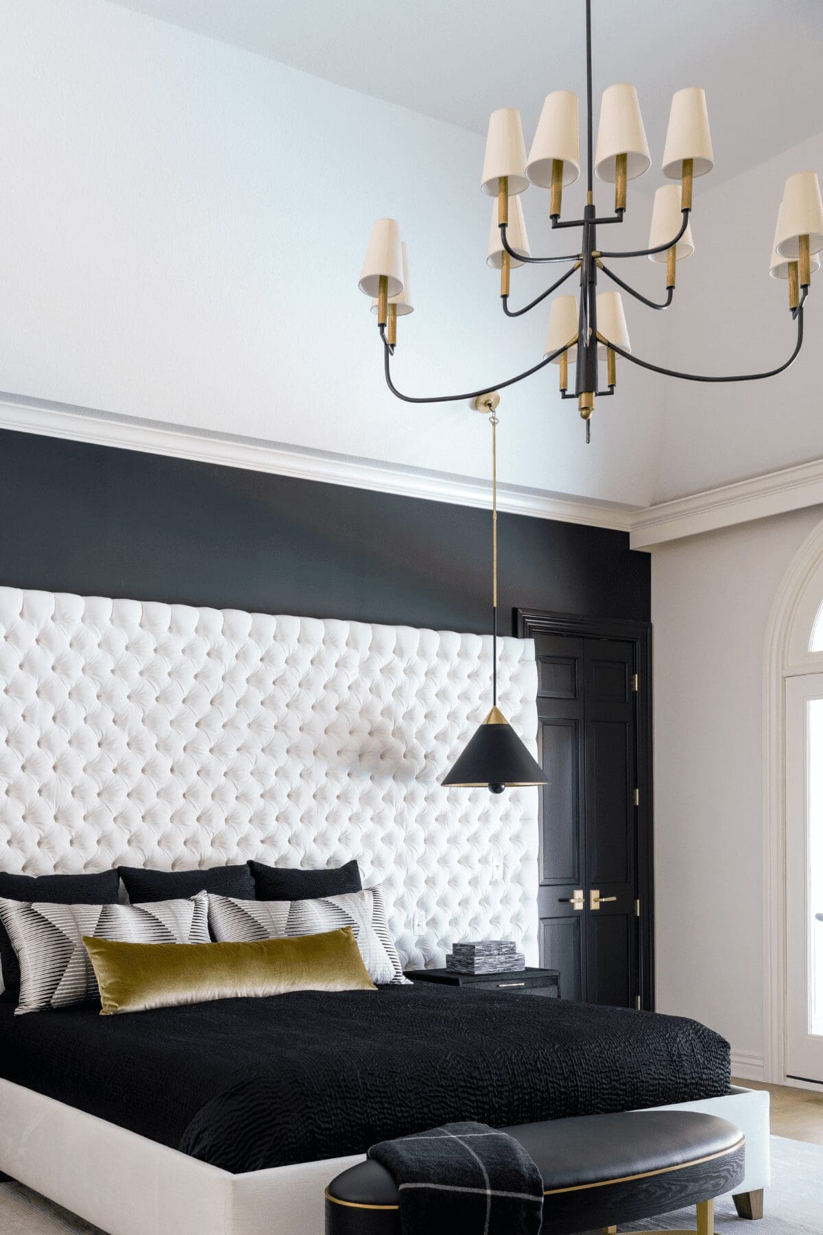 statement lighting in entryway by Kirkendall Design