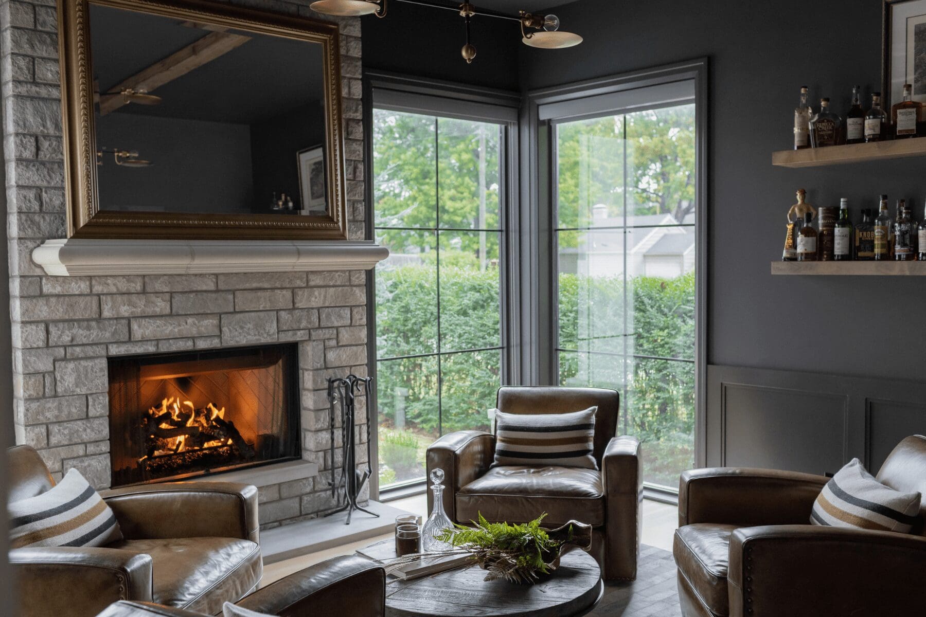 moody man cave and whiskey room, interior design by Kirkendall Design in Tulsa, Oklahoma