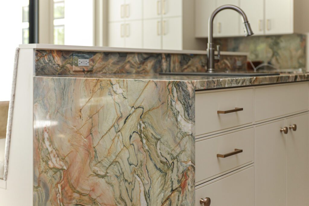 waterfall edge kitchen cabinet granite design, interior design by Kirkendall Design in Tulsa, OK