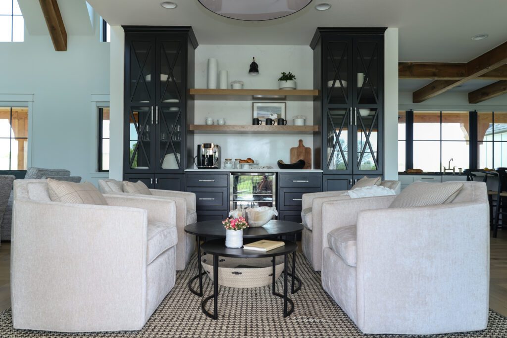 Coffee bar designed by Kirkendall Design in Tulsa, featuring neutral light colored swivel chairs with performance fabrics.