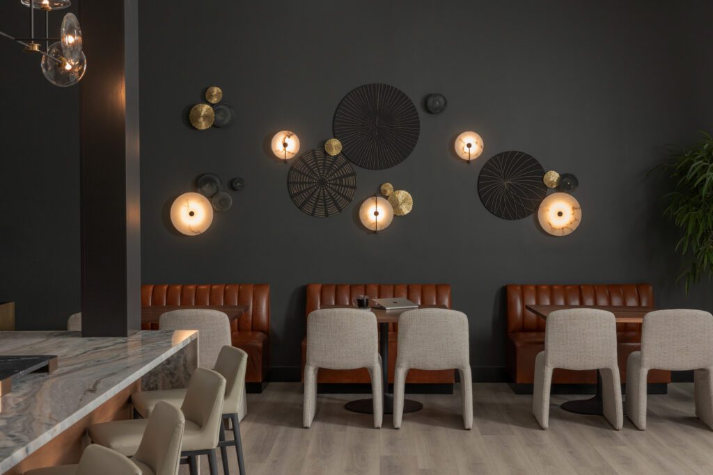 black accent wall commercial interior design by Kirkendall Design in Tulsa, OK