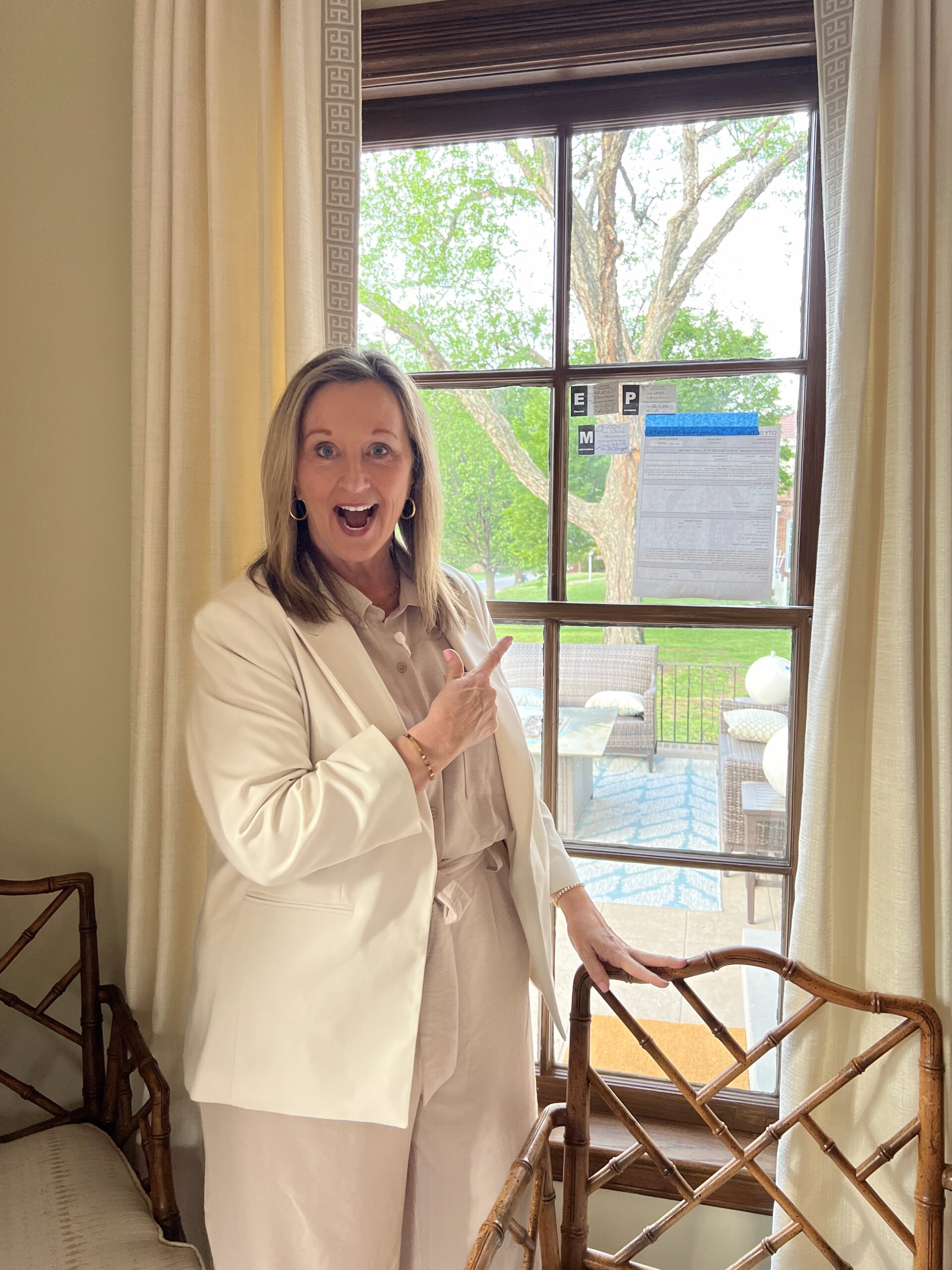 Julia Kirkendall, principal designer and owner of Kirkendall Design poses in the 2025 Designer Showcase home