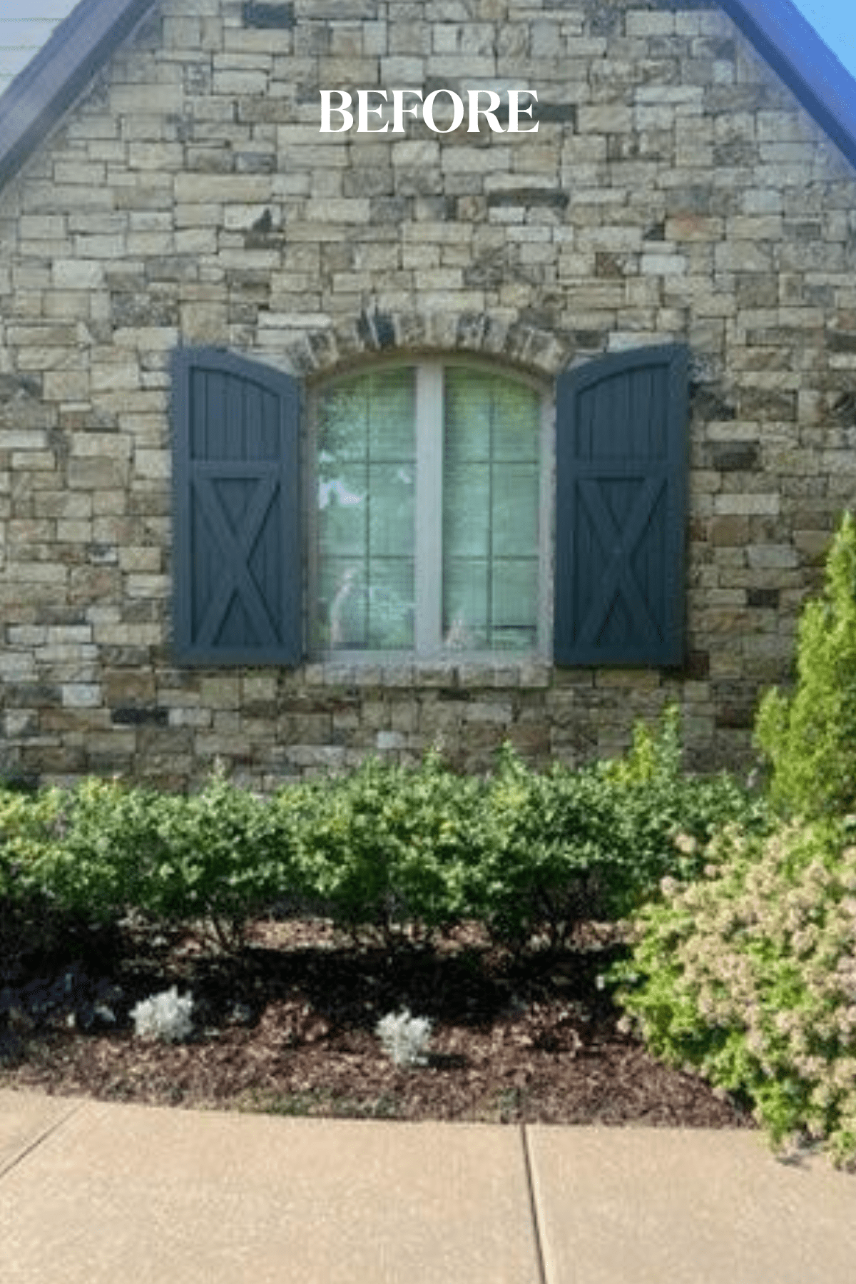 Before exterior stone photo with tan brick and shutters prior to limewash refresh Tulsa