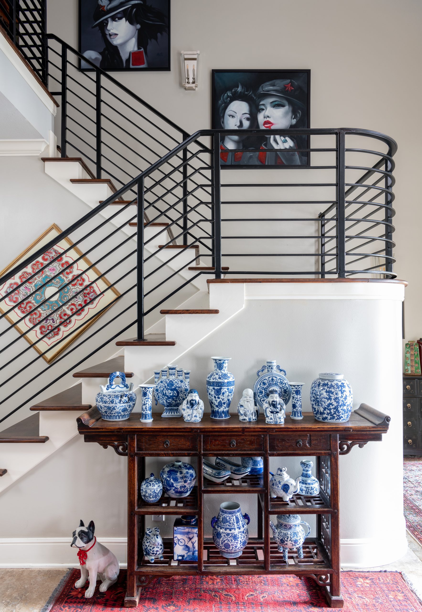 Custom stairwell renovation designed by Kirkendall Design with updated architectural details for this multigenerational luxury Tulsa home.